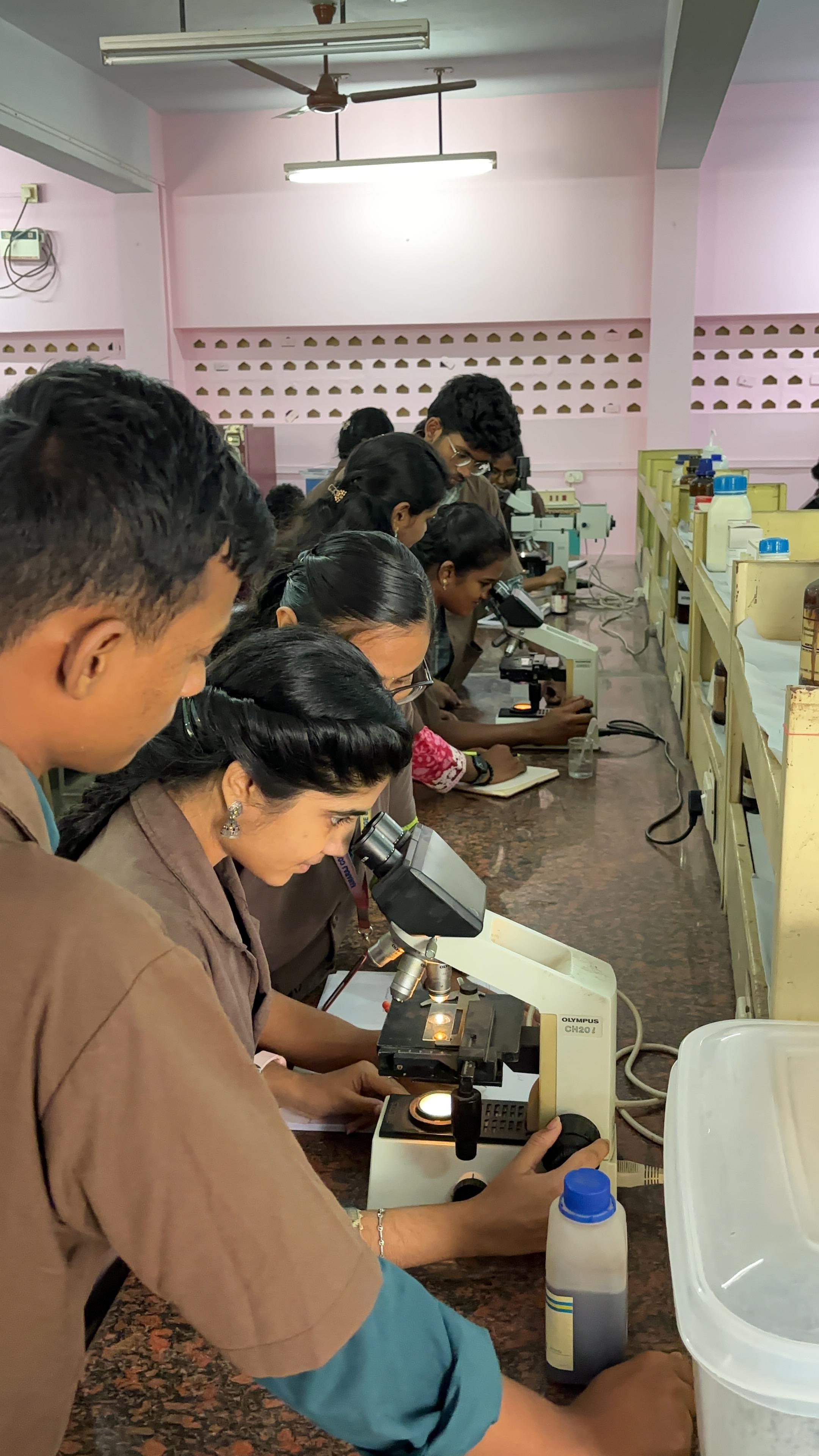 Students observing a supervised preclinical research demonstration
